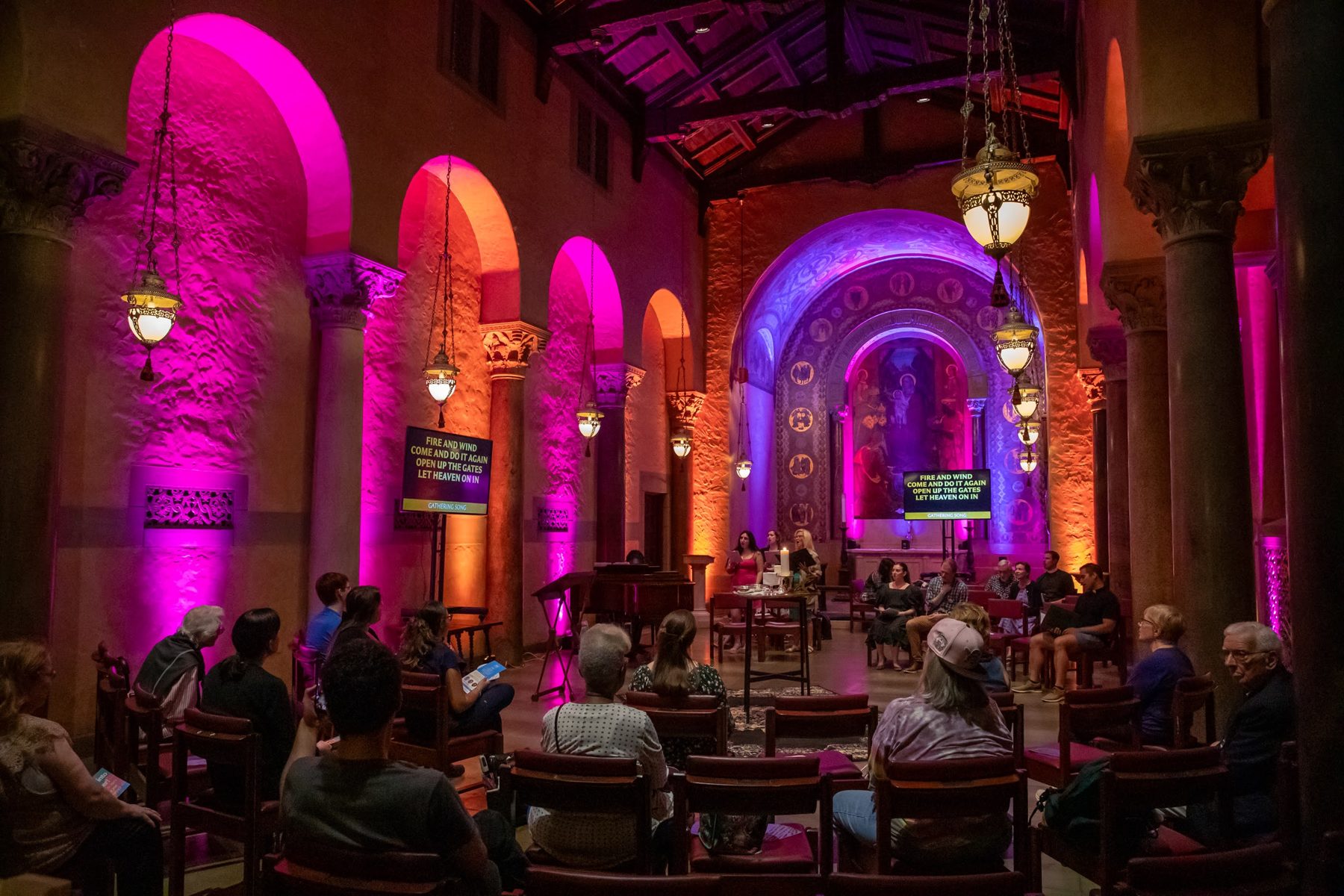 The lit arches and columns of St. Bart's during worship